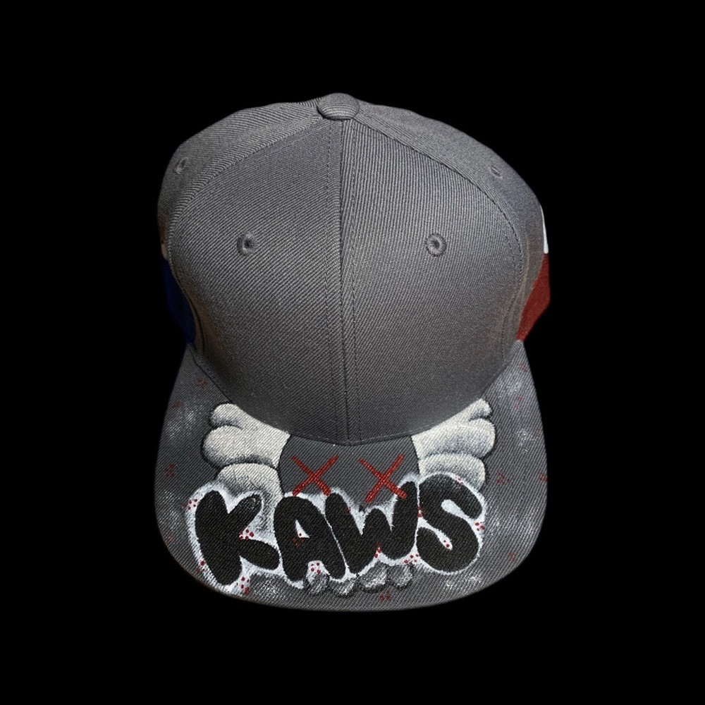 KAWS Gray Snapback Cap with Painted Brim and Red Accents